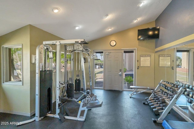 exercise room featuring lofted ceiling