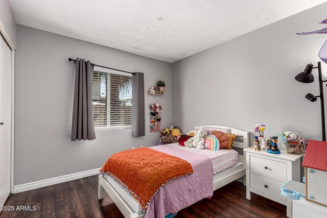 5302 W Poinsettia Dr, Glendale, AZ 85304 - bedroom with wood finished floors and baseboards