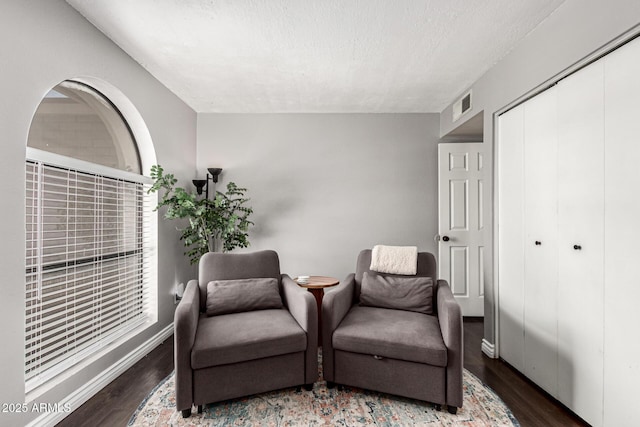 5302 W Poinsettia Dr, Glendale, AZ 85304 - living area featuring wood finished floors and a textured ceiling