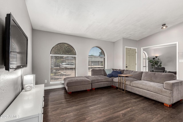 5302 W Poinsettia Dr, Glendale, AZ 85304 - living room with dark wood-style flooring and baseboards