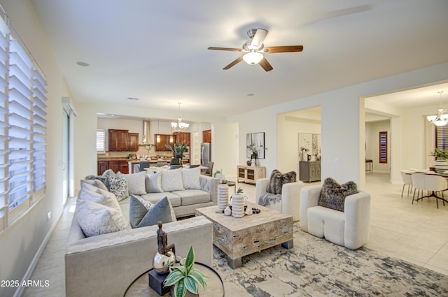 3753 E Ellis St, Mesa, AZ 85205 - living room with baseboards and ceiling fan with notable chandelier
