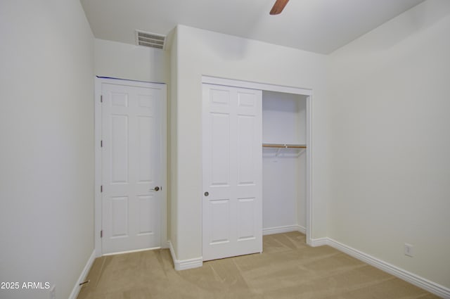3753 E Ellis St, Mesa, AZ 85205 - unfurnished bedroom with ceiling fan, visible vents, baseboards, a closet, and light carpet