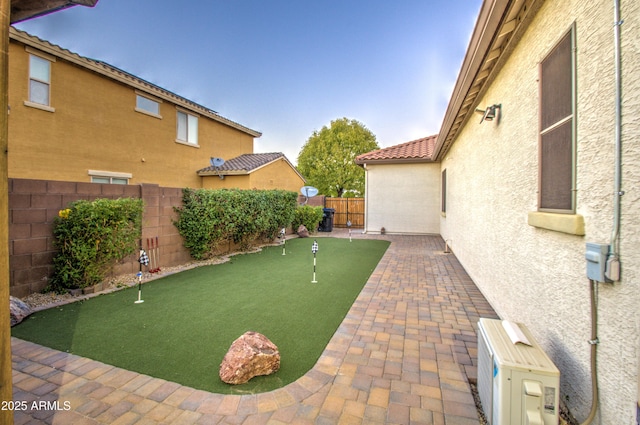 3753 E Ellis St, Mesa, AZ 85205 - view of yard with a fenced backyard, a patio, and ac unit