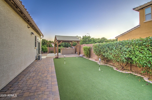 3753 E Ellis St, Mesa, AZ 85205 - view of yard featuring a fenced backyard, a patio, a gazebo, and central AC unit