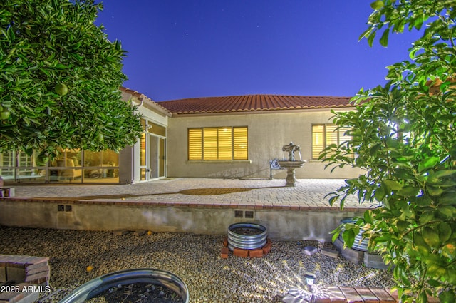 3753 E Ellis St, Mesa, AZ 85205 - back of house featuring a patio, stucco siding, and a tile roof