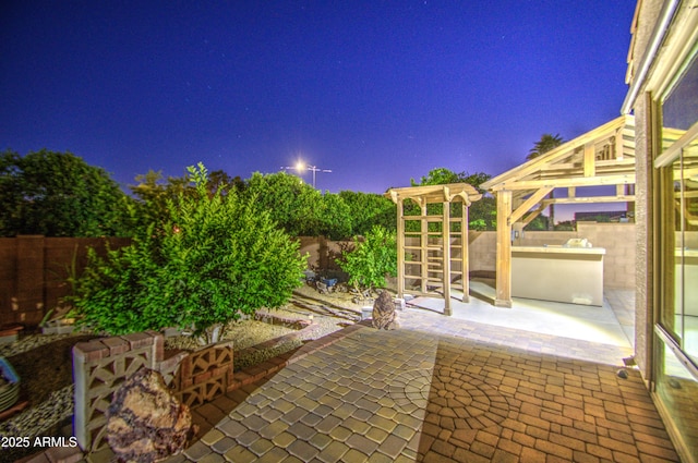 3753 E Ellis St, Mesa, AZ 85205 - patio at night with a fenced backyard