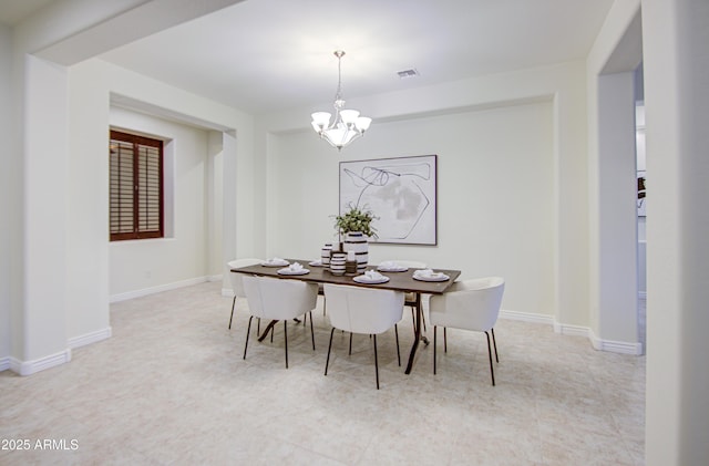 3753 E Ellis St, Mesa, AZ 85205 - dining space with an inviting chandelier, baseboards, and visible vents