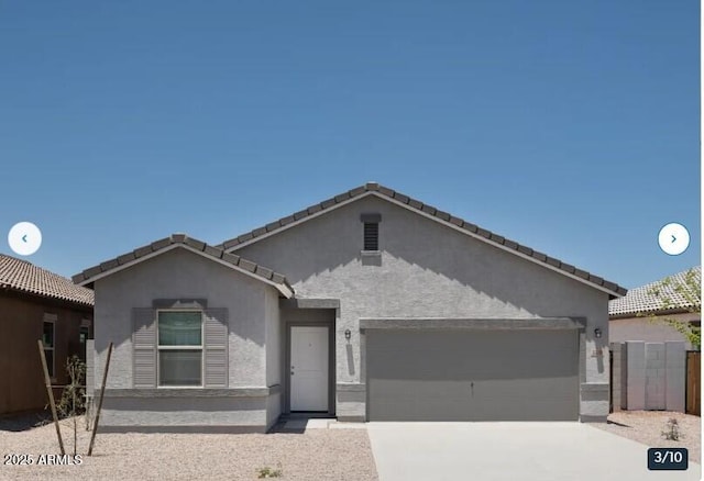 view of front of home with a garage