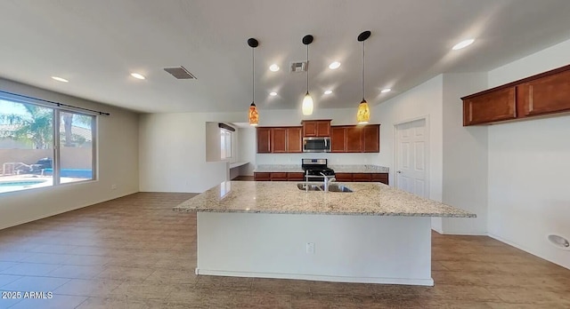 984 W Belmont Red Trl, San Tan Valley, AZ 85143 - kitchen featuring stainless steel appliances, a sink, recessed lighting, light stone countertops, and decorative light fixtures