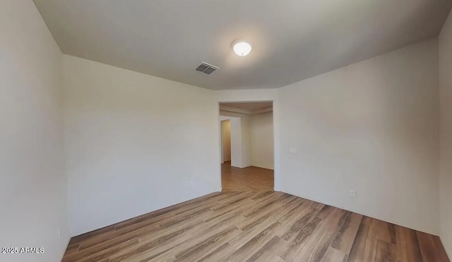 984 W Belmont Red Trl, San Tan Valley, AZ 85143 - spare room featuring wood finished floors