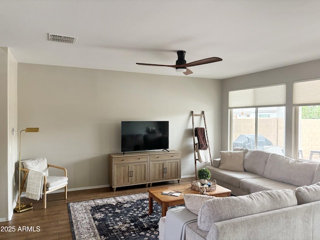 984 W Belmont Red Trl, San Tan Valley, AZ 85143 - living area with ceiling fan, dark wood-style flooring, and baseboards