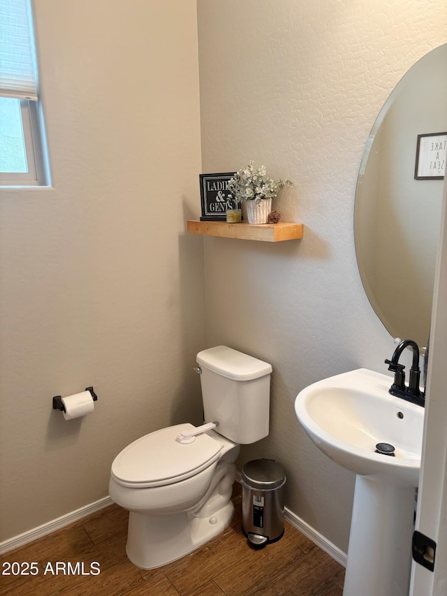 984 W Belmont Red Trl, San Tan Valley, AZ 85143 - half bathroom featuring wood finished floors, toilet, and baseboards