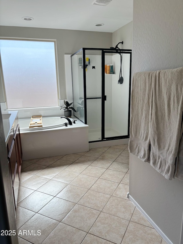 984 W Belmont Red Trl, San Tan Valley, AZ 85143 - full bath featuring a shower stall, a bath, tile patterned floors, vanity, and a textured wall