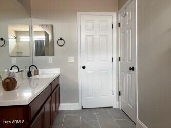 984 W Belmont Red Trl, San Tan Valley, AZ 85143 - bathroom featuring baseboards and double vanity