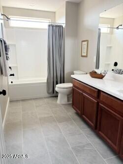 984 W Belmont Red Trl, San Tan Valley, AZ 85143 - bathroom featuring vanity, shower / bathtub combination with curtain, toilet, and tile patterned flooring