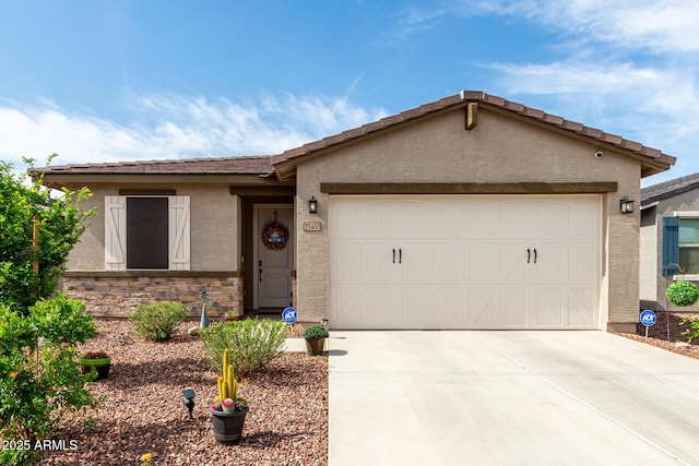 ranch-style house with stucco siding, concrete driveway, and a garage