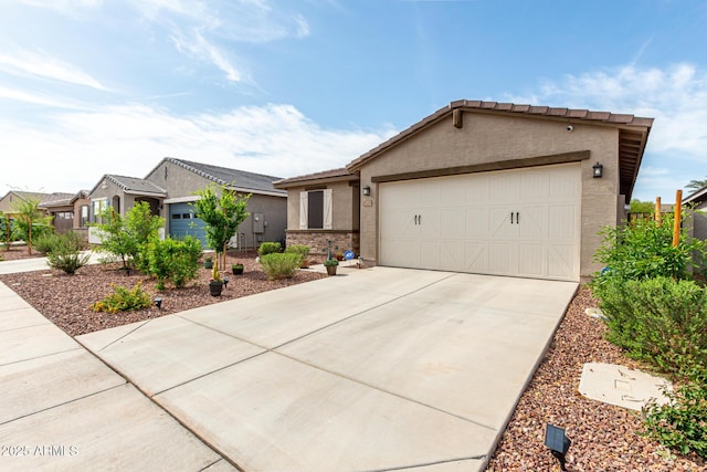 single story home featuring stucco siding, driveway, and a garage