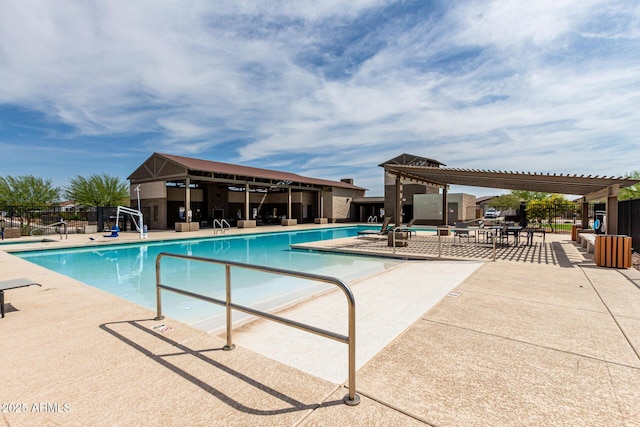 community pool featuring a pergola, fence, and a patio area