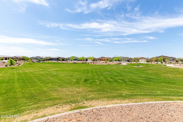 view of yard featuring a residential view