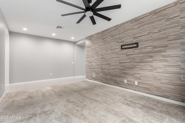 unfurnished room featuring a ceiling fan, visible vents, baseboards, recessed lighting, and carpet flooring