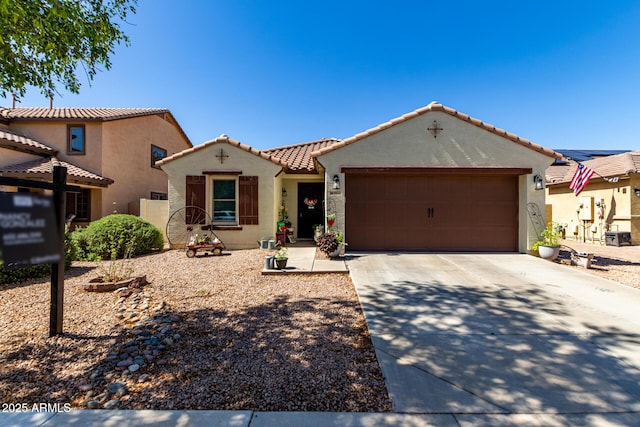 14112 W Larkspur Dr, Surprise, AZ 85379 - mediterranean / spanish house featuring stucco siding, driveway, an attached garage, and a tiled roof