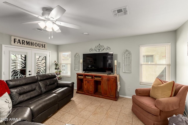 14112 W Larkspur Dr, Surprise, AZ 85379 - living area featuring baseboards, a ceiling fan, and light tile patterned flooring