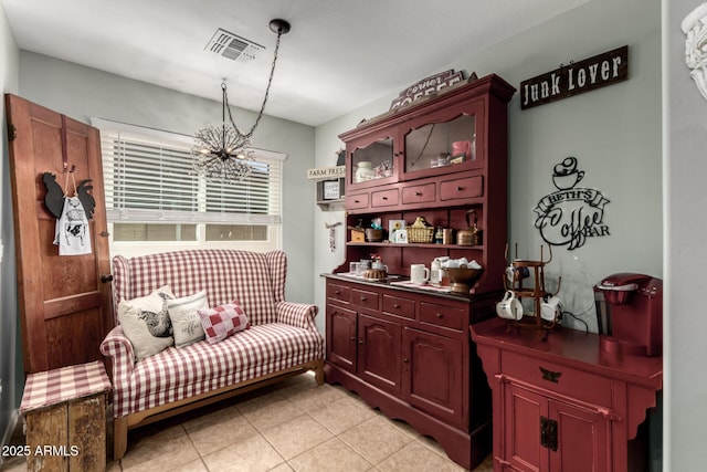 14112 W Larkspur Dr, Surprise, AZ 85379 - sitting room with a chandelier and light tile patterned floors