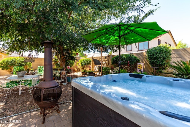 14112 W Larkspur Dr, Surprise, AZ 85379 - view of patio with a hot tub and fence