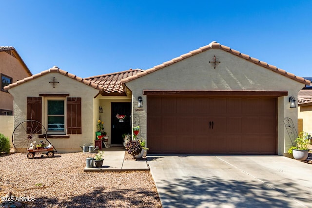 14112 W Larkspur Dr, Surprise, AZ 85379 - mediterranean / spanish home featuring a tiled roof, an attached garage, concrete driveway, and stucco siding