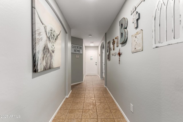 14112 W Larkspur Dr, Surprise, AZ 85379 - corridor with baseboards and light tile patterned floors