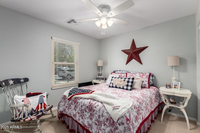 14112 W Larkspur Dr, Surprise, AZ 85379 - carpeted bedroom with baseboards and ceiling fan