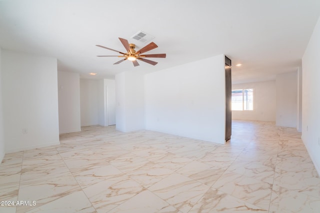 spare room featuring ceiling fan