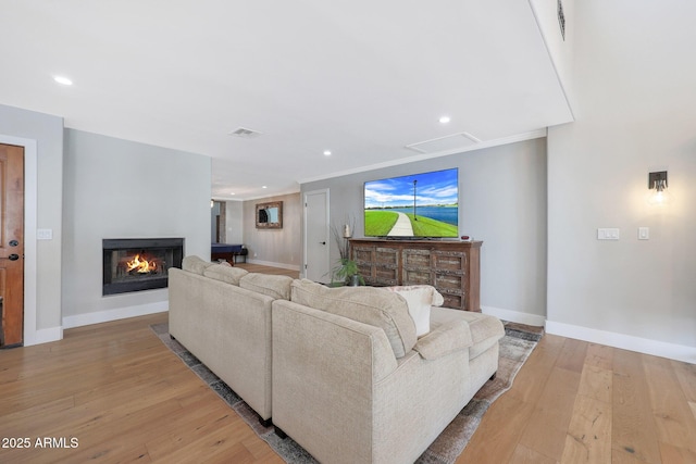 living room with light hardwood / wood-style floors