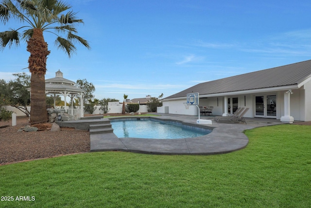 view of swimming pool with a gazebo, a patio area, and a lawn