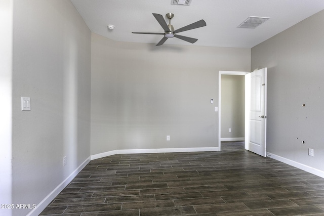 spare room featuring ceiling fan and dark hardwood / wood-style flooring