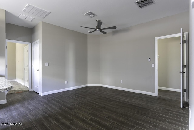 unfurnished room featuring dark hardwood / wood-style floors and ceiling fan