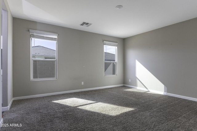 unfurnished room with carpet floors