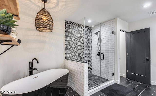 full bath with a freestanding tub, recessed lighting, visible vents, a shower stall, and tile patterned floors