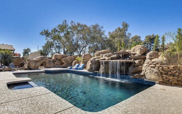 pool with a patio area