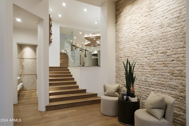 staircase featuring hardwood / wood-style flooring