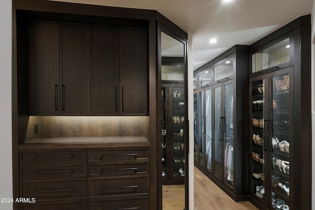 walk in closet featuring light wood-type flooring