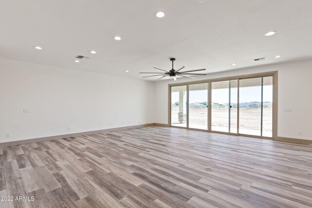 0000 W Hooper Trl Unit 3, Queen Creek, AZ 85144 - spare room with light wood finished floors, visible vents, recessed lighting, and ceiling fan