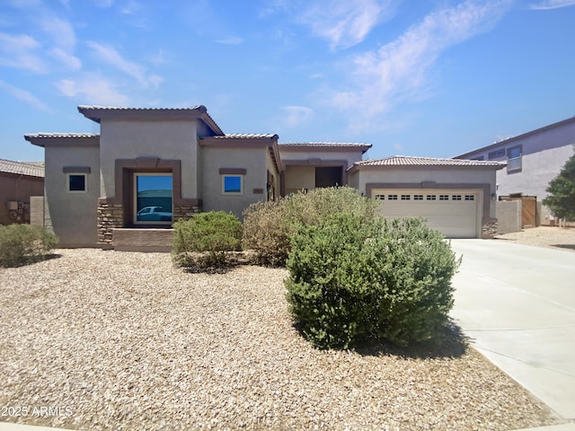 2971 N Rosewood Ave, Casa Grande, AZ 85122 - mediterranean / spanish-style home with stucco siding, a garage, driveway, and a tiled roof