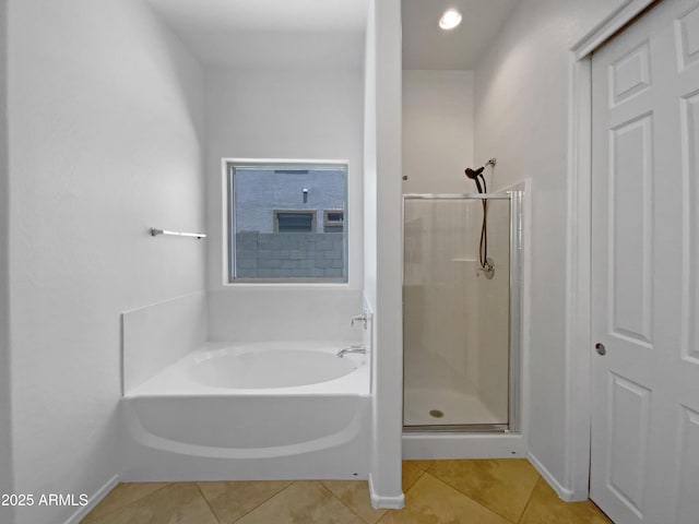 2971 N Rosewood Ave, Casa Grande, AZ 85122 - bathroom featuring tile patterned floors, a stall shower, a bath, and baseboards