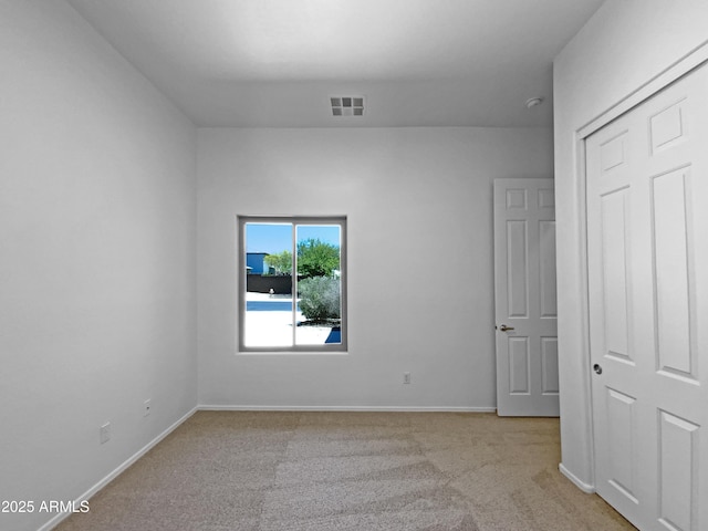 2971 N Rosewood Ave, Casa Grande, AZ 85122 - unfurnished bedroom with carpet floors, baseboards, and a closet