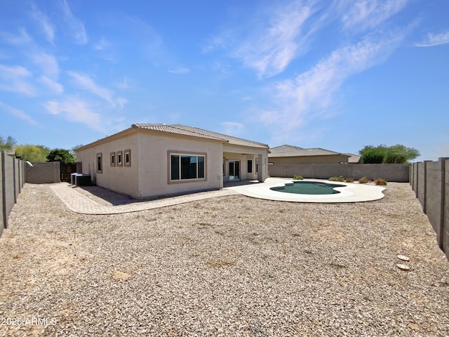 2971 N Rosewood Ave, Casa Grande, AZ 85122 - rear view of property featuring a patio area, a fenced backyard, and stucco siding