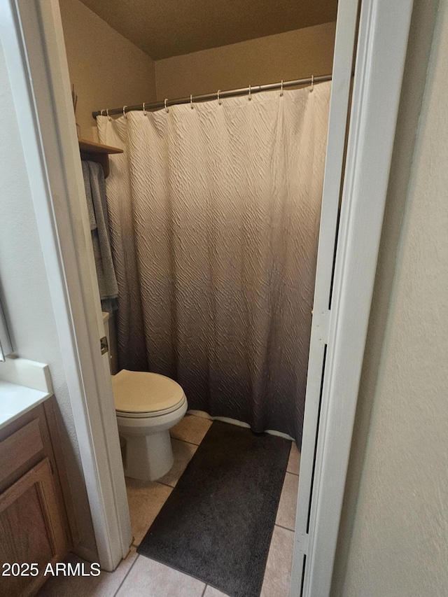 6036 W Mescal St, Glendale, AZ 85304 - bathroom featuring tile patterned flooring, toilet, and vanity