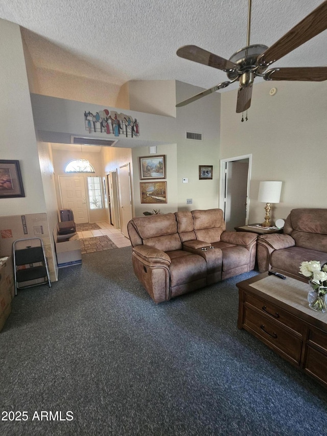 6036 W Mescal St, Glendale, AZ 85304 - carpeted living room with a textured ceiling, lofted ceiling, and a ceiling fan