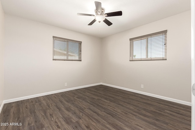 6022 E Colby St, Mesa, AZ 85205 - unfurnished room with dark wood finished floors and a ceiling fan
