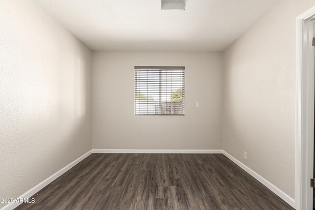 6022 E Colby St, Mesa, AZ 85205 - spare room with dark wood-style floors